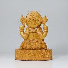 Bottom back view of the 10cm wide rectangular base of a solid wood Ganesha, showing the stable construction.
