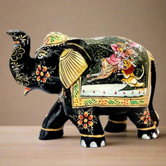 A 13cm tall handcrafted wooden elephant decor piece with unique painting details.