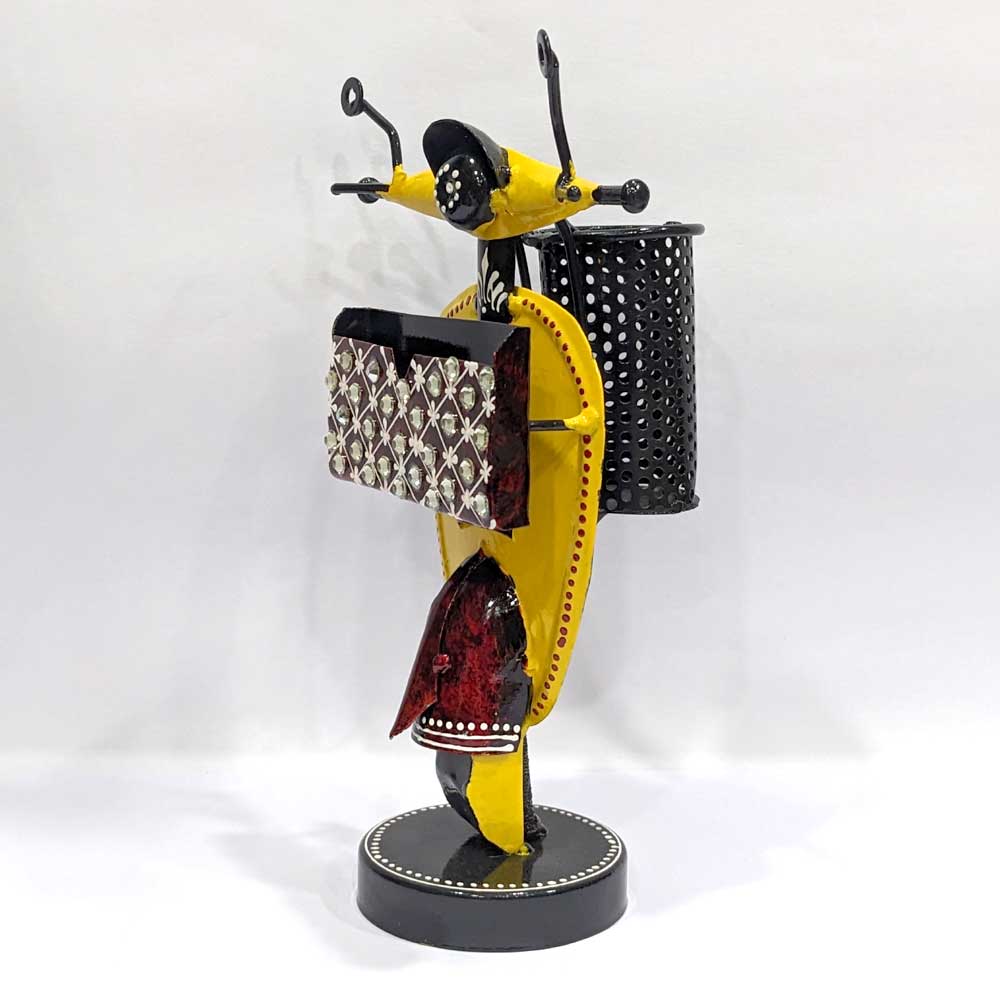 A 22cm metal pen holder with a scooter design that will add beauty to your office desk.