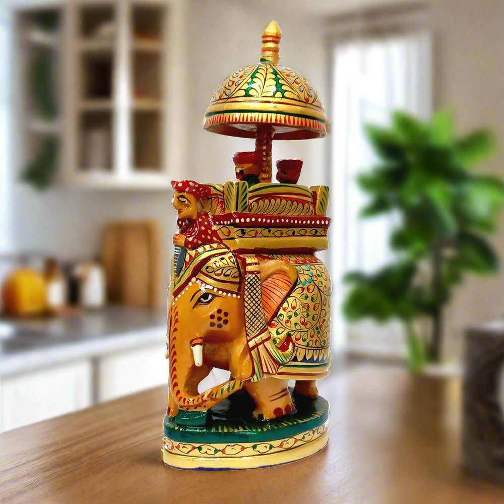 A 23cm wooden elephant showpiece, featuring a king and queen on a beautifully decorated elephant.