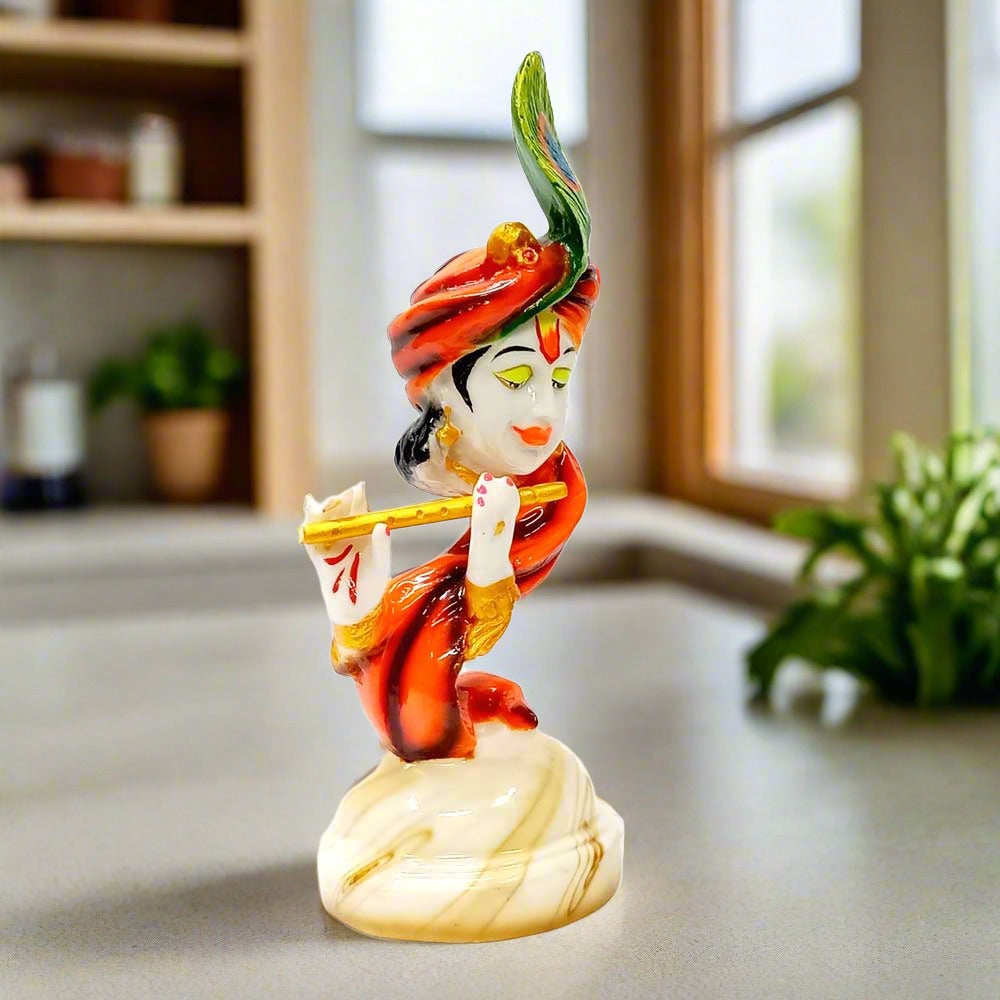 An amazing Krishna statue playing the flute, a perfect gift item for any occasion.