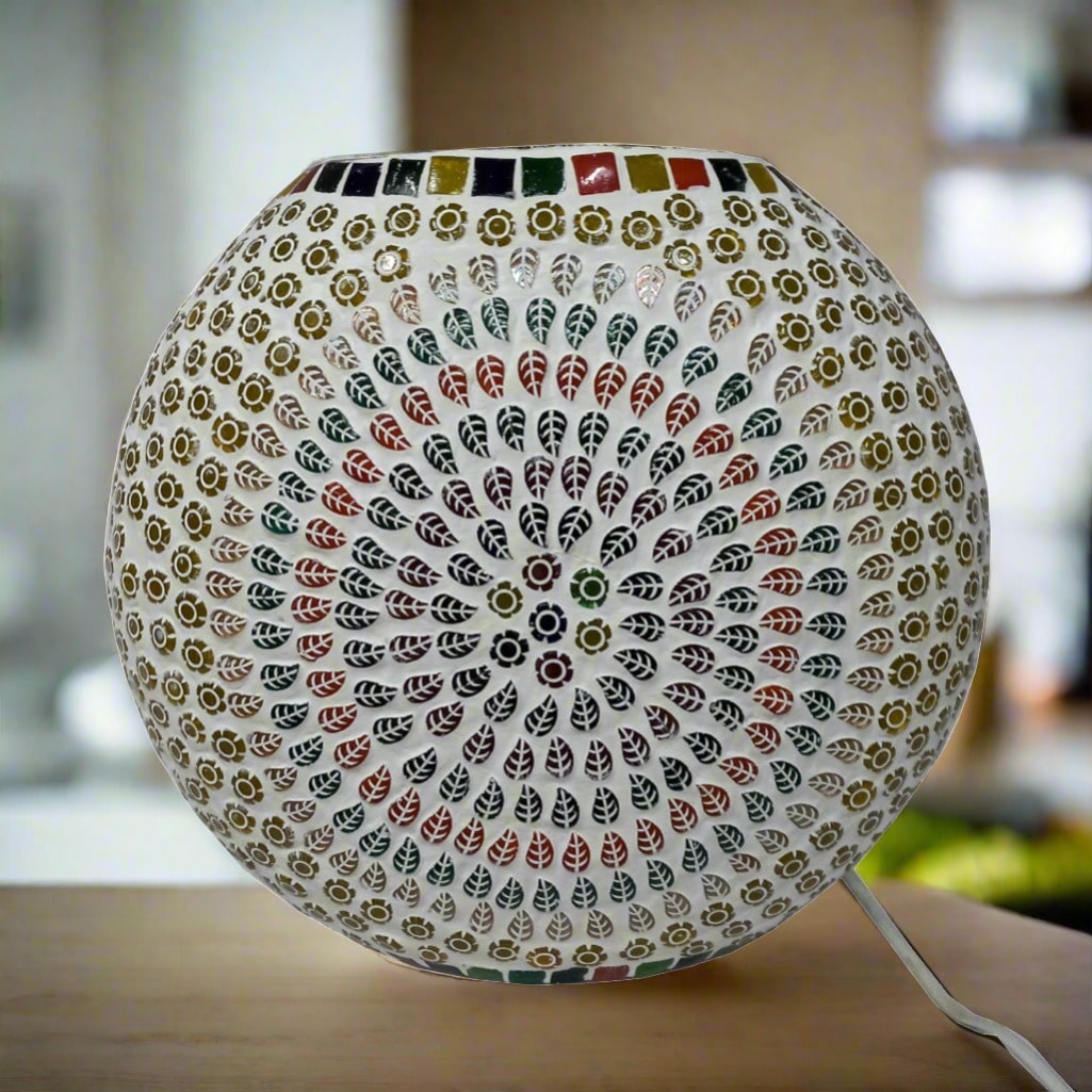 An amazing oval glass lamp with a beautiful mosaic design that attracts everyone's attention.