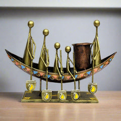 An antique-style metal showpiece pen holder that will enhance the look of any office.