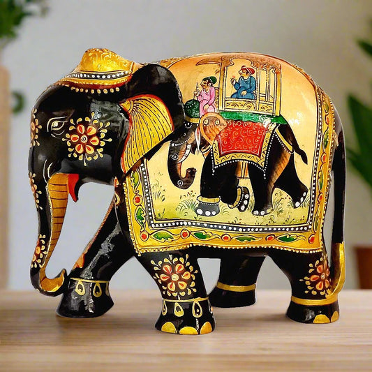 A wooden elephant figurine masterpiece with an antique look and intricate hand painting.