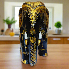 Decorative wooden elephant figurine with colorful miniature designs