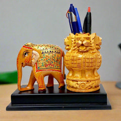 Ashoka Pillar wooden pen holder with hand-painted elephant sculpture.