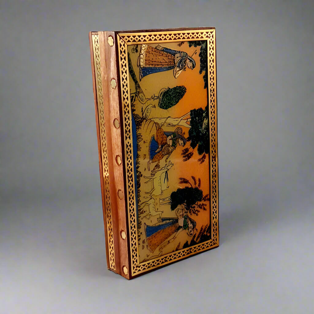 An attractive wooden jewellery box with a beautiful handmade painting, ideal for personal use.