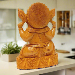 Auspicious wooden Lord Ganesha figurine considered ideal for home temple.