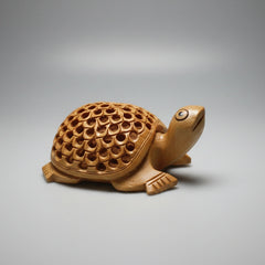 Front view of the auspicious wooden tortoise statue, perfect for placing in a pooja room or office.