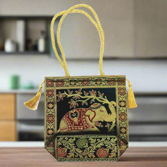 Banarasi silk tote with golden tassels on both sides, perfect for shopping travel.