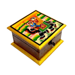 A very beautiful hand-painted wooden box with an elephant design, perfect for decor.