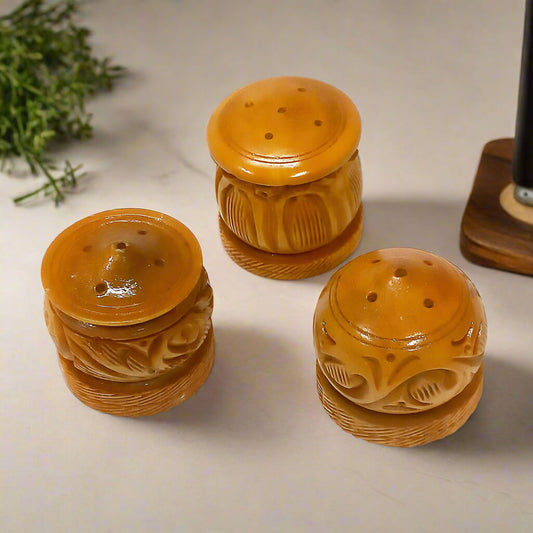 A carved wood incense stick stand with 5 holes, a great addition to your worship room.