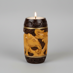 Carved wooden tea light holder featuring a safe aluminum cup for mess-free candle burning.