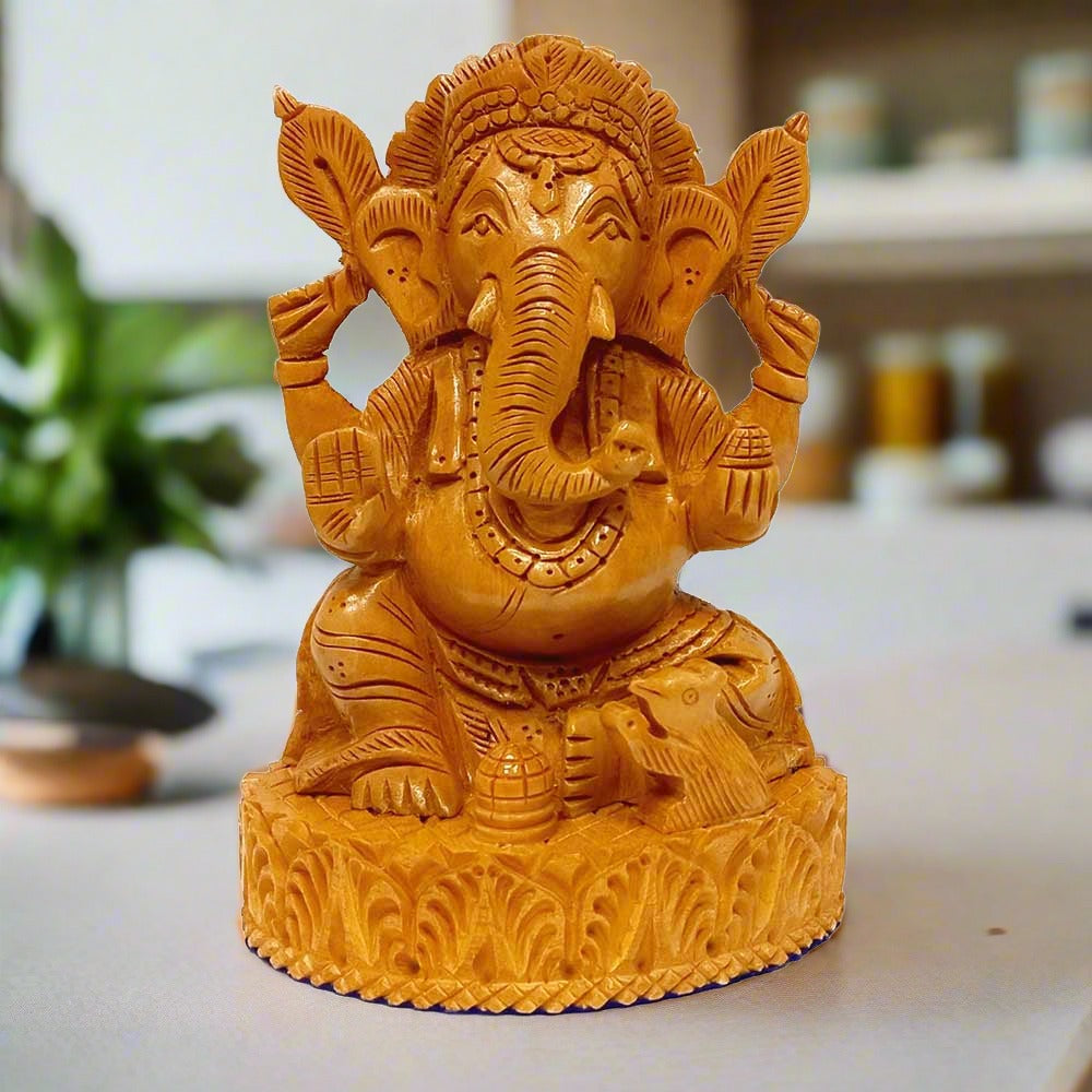 Carved wooden Ganesha statue, completely handmade from a single piece of wood.