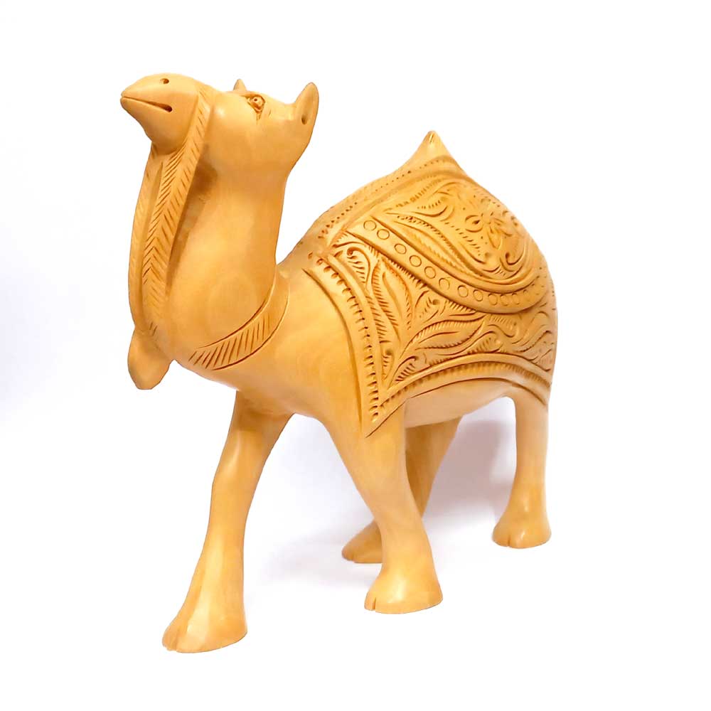 A hand-carved wooden statue of a camel, known as the ship of the desert.