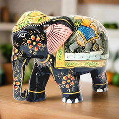 Classic wooden elephant carved from Kadamba wood, featuring black paint and handcrafted Mughal paintings