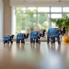 Miniature lacquer elephant figurines in vibrant colors, set of 4 decorative pieces