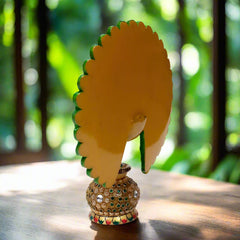 Elegant wooden peacock in dancing pose with decorative accents