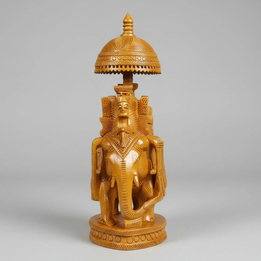 Premium wooden Ambabari elephant displayed on a modern executive office desk as a luxury gift for a boss.