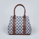 Close-up detail of the premium quality cotton fabric showing the vibrant floral print and high-stitch ethnic pattern.