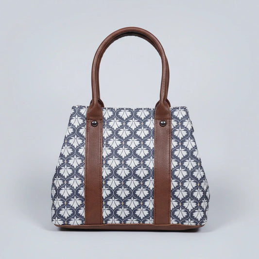 Close-up detail of the premium quality cotton fabric showing the vibrant floral print and high-stitch ethnic pattern.