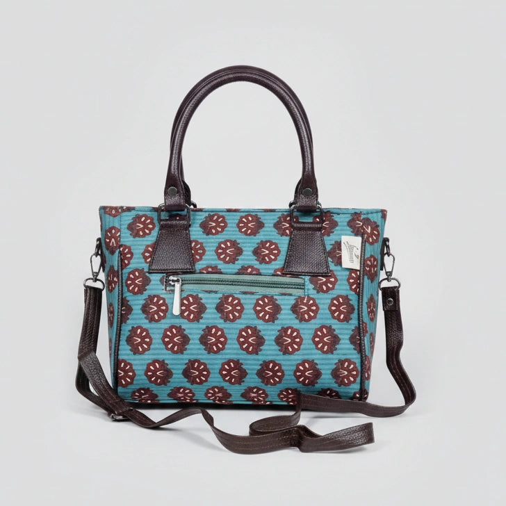 Back view of the handbag showing the secure exterior zip pocket