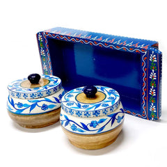 A decorative hand-painted wooden serving platter with two containers, ideal for home decor.