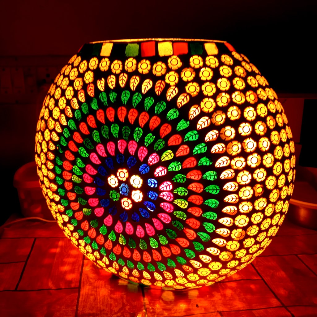 A decorative mosaic lamp, a great wedding gift that creates a warm ambiance.