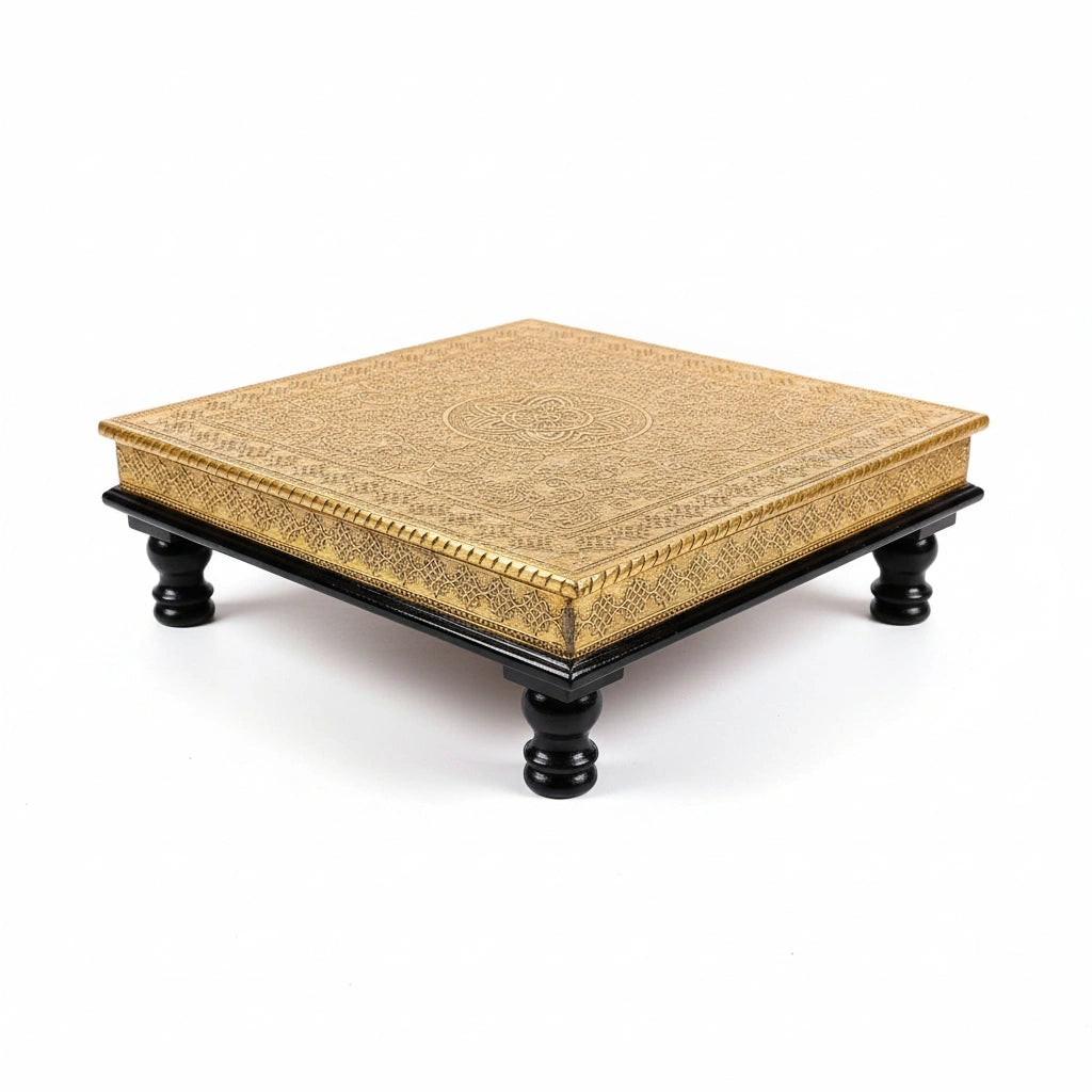 Decorative wooden chowki stool featuring intricate metal sheet art in a dark brown finish.