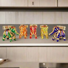 Decorative elephant candle holder set of 5 pieces with colorful designs.