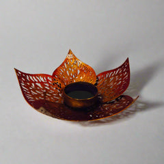 Elegant round metal lotus candle holder with bloom leaf motif, perfect for gifting on weddings and anniversaries.