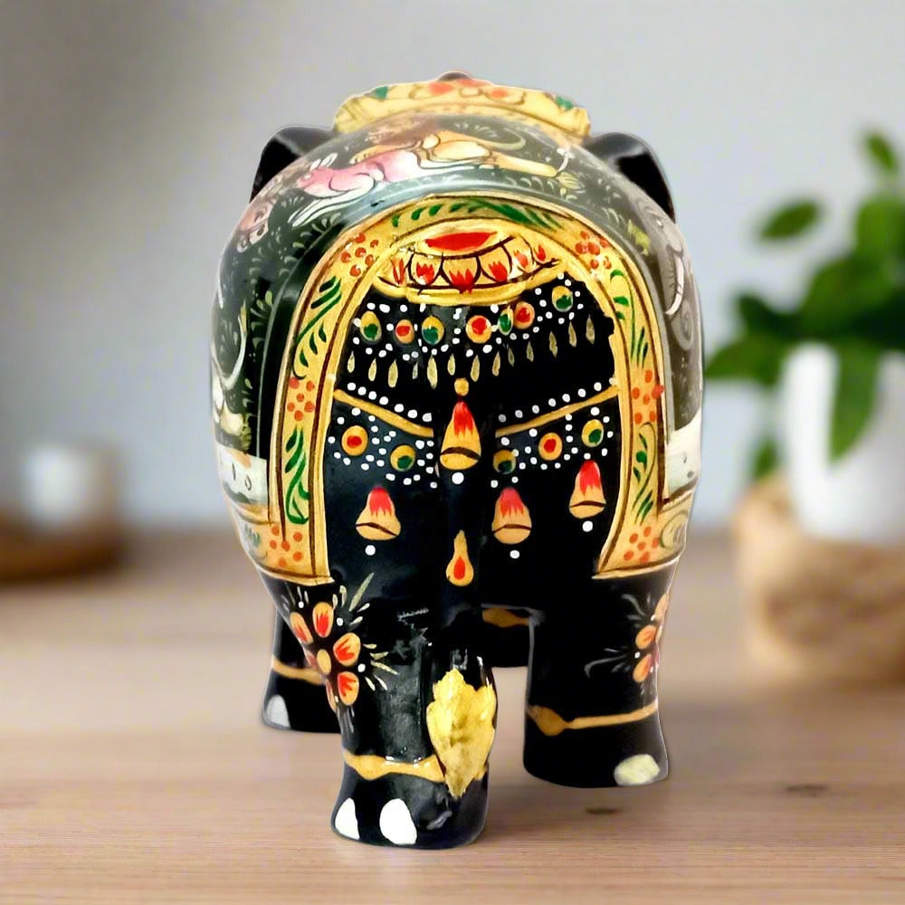 An elegant wooden elephant showpiece, a beautiful piece for tabletop decor.