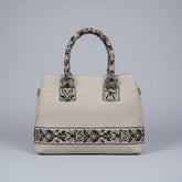 Elegant woven texture handbag with dual top handles and premium tactile finish from KK Gift Store.