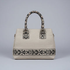 Elegant woven texture handbag with dual top handles and premium tactile finish from KK Gift Store.