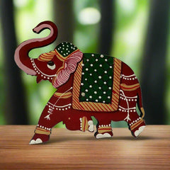 Wooden elephant magnet symbolizing good luck and positivity