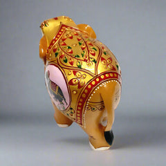 An emboss-painted low-trunk elephant, a spectacular gift item for any occasion.