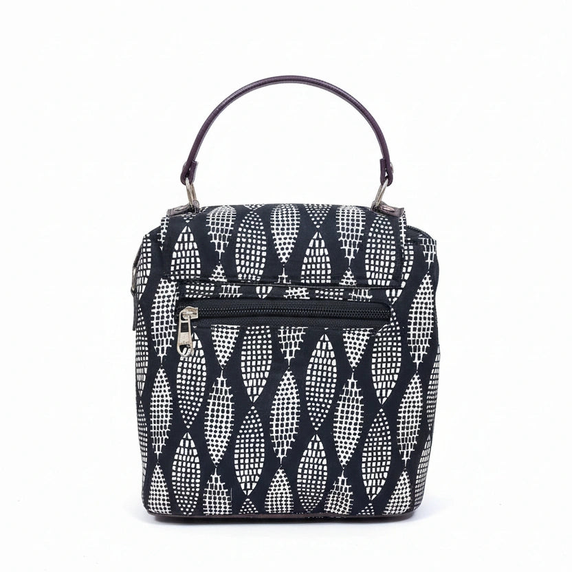 Rear view of an ethnic printed cotton bag showing the secure back side zip