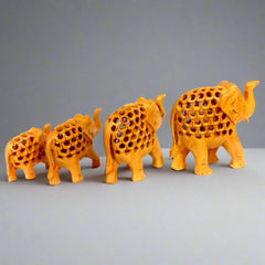 Wooden elephant family set in 4, 3, 2.5, 2 inch sizes