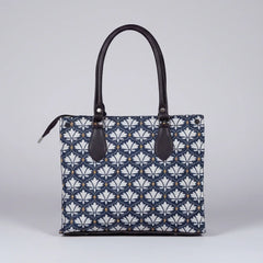 Premium floral print cotton handbag for women with strong PU leather handles.