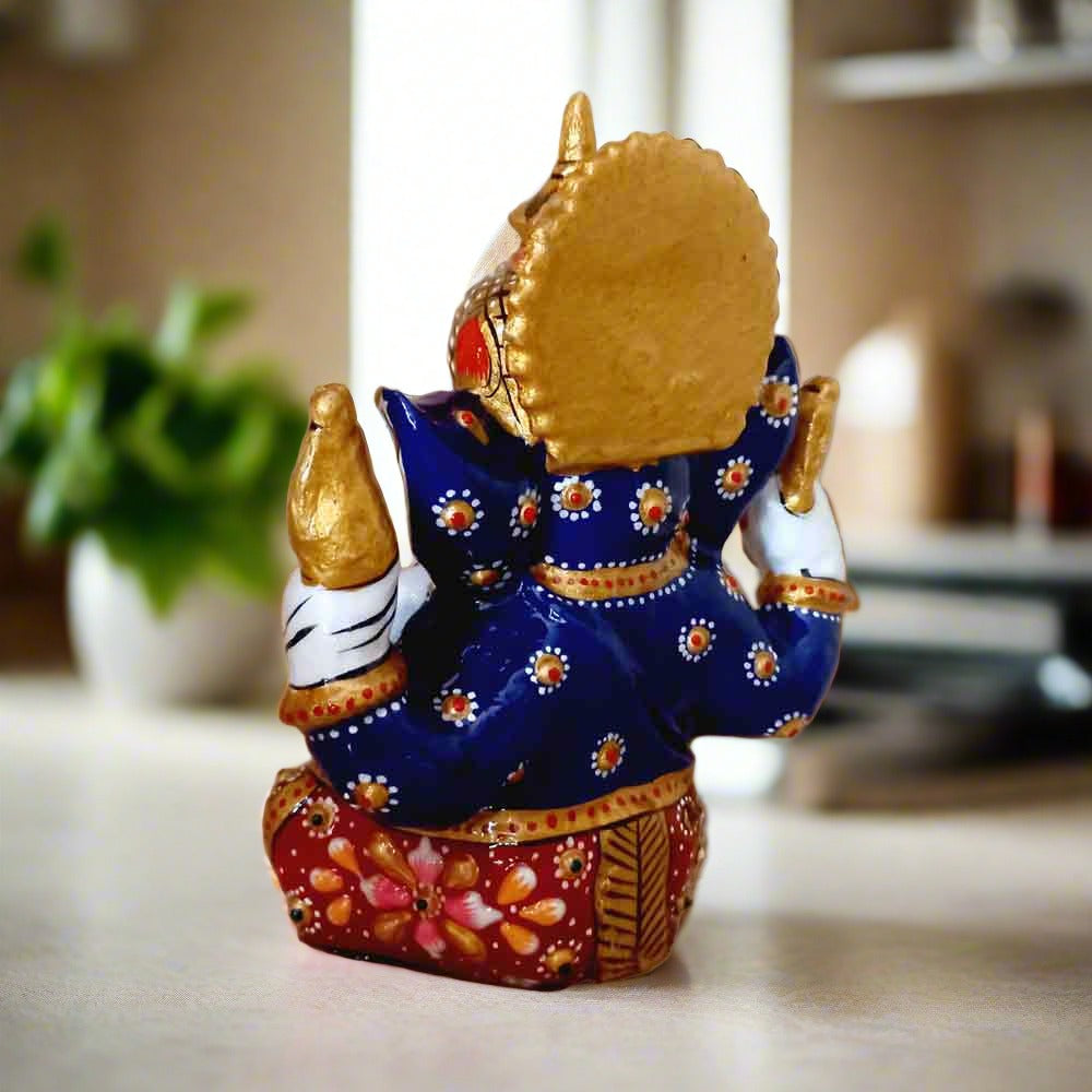 Vibrant multi-color enamel Ganesha statue with traditional crown