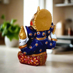 Vibrant multi-color enamel Ganesha statue with traditional crown