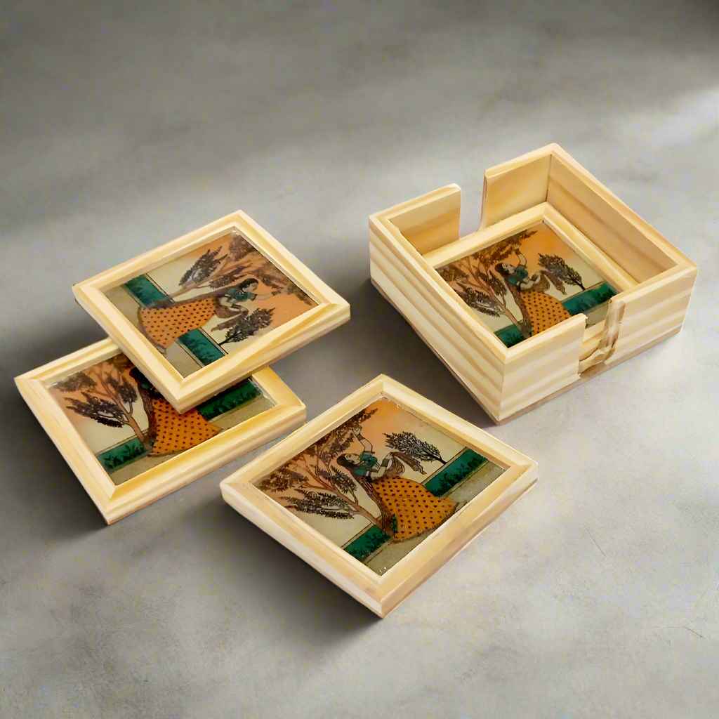 Elegant pine wood rotating coaster set featuring intricate semi-precious gemstone art on glass surfaces.