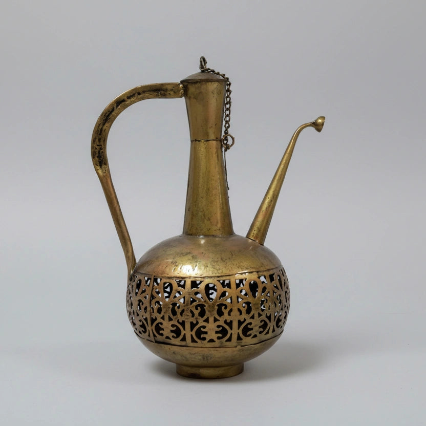 Gold oxidized metal Surahi shaped candle holder featuring lattice design and royal antique finish.