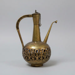 Gold oxidized metal Surahi shaped candle holder featuring lattice design and royal antique finish.