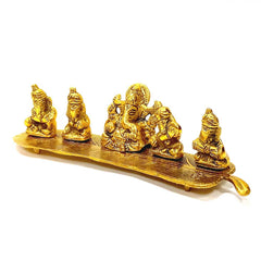 A golden oxidized metal Ganesh figurine, a perfect and unique gift for home decor.