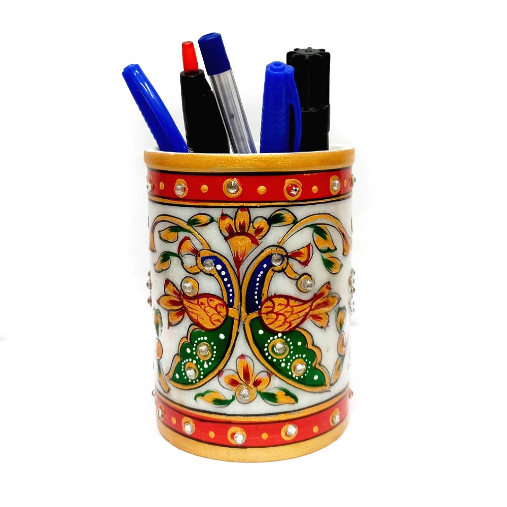 A hand-painted and embossed marble desk accessory with a unique design, adding elegance to any workspace.