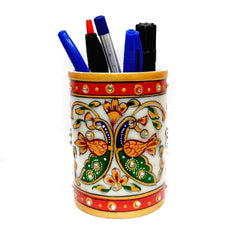 A hand-painted and embossed marble desk accessory with a unique design, adding elegance to any workspace.