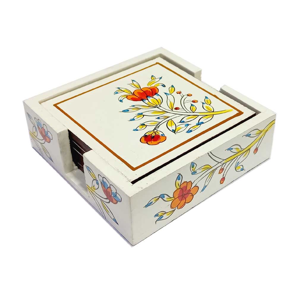 A set of hand-painted wooden coasters with a lovely floral design, protected by varnish.