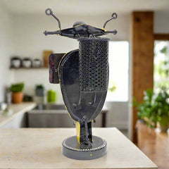 A hand-painted metal desk accessory with a beautiful scooter design, a useful and decorative piece.