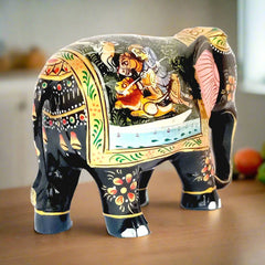 Hand-painted wooden elephant with Mughal design on both sides, low trunk, perfect for home decoration